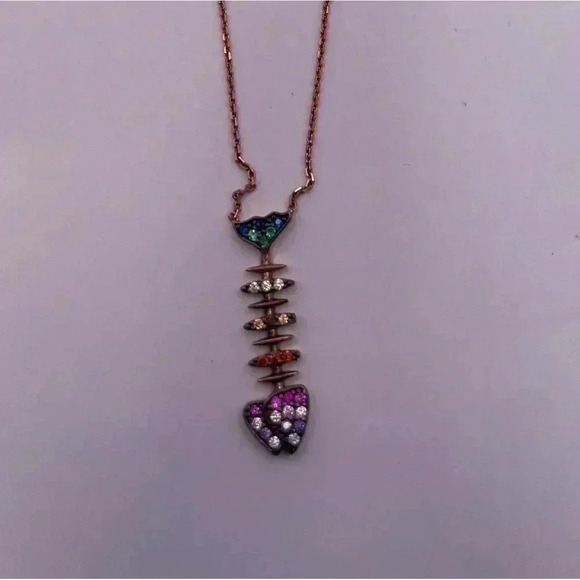 Rainbow CZ gems embellish this contemporary fishbone pendant necklace - Picture 4 of 4